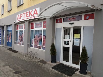 Victoria. Apteka. Hylak J., магазин рядом с вокзалом Racibórz