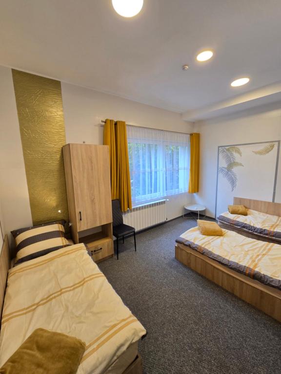 Pokoje gościnne GOOD NIGHT apartamenty, noclegi, жильё рядом с вокзалом Бендзин-Място