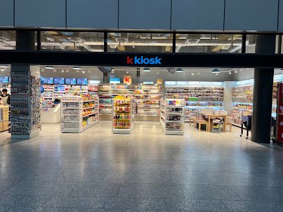 k kiosk, магазин рядом с вокзалом Zürich Flughafen