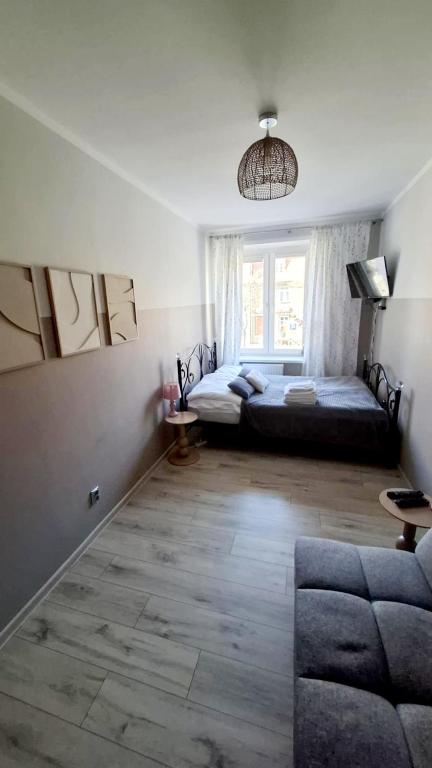 Old Town Room Ełk, жильё рядом с вокзалом Эльк