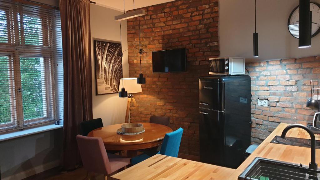 Apartament Wysoka Brama 1/4, жильё рядом с вокзалом Грыфице