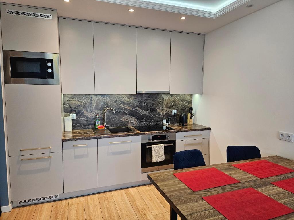 Nowoczesny i komfortowy apartament przy ulicy Kurpiowskiej blisko centrum miasta, жильё рядом с вокзалом Седльце