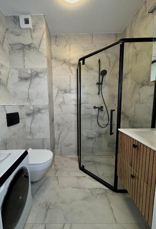 Apartament Kwiatowa, жильё рядом с вокзалом Тыхы